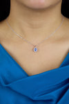 0.73 Carat Total Oval Cut Sapphire & Diamond Halo Pendant Necklace in White Gold