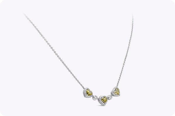 1.74 Carats Total Heart Shape Fancy Intense Yellow and Round Diamond Necklace in Platinum