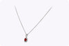 0.59 Carat Total Oval Cut Ruby and Diamond Halo Pendant Necklace in White Gold
