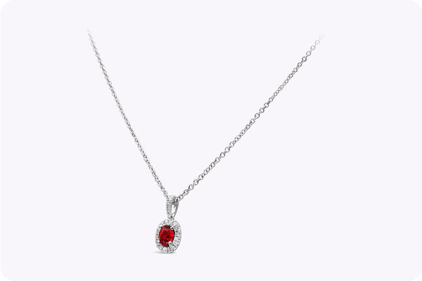 0.38 Carat Total Oval Cut Ruby and Diamond Halo Pendant Necklace in White Gold