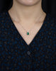 1.27 Carat Emerald Cut Green Emerald and Diamond Pendant Necklace in White Gold
