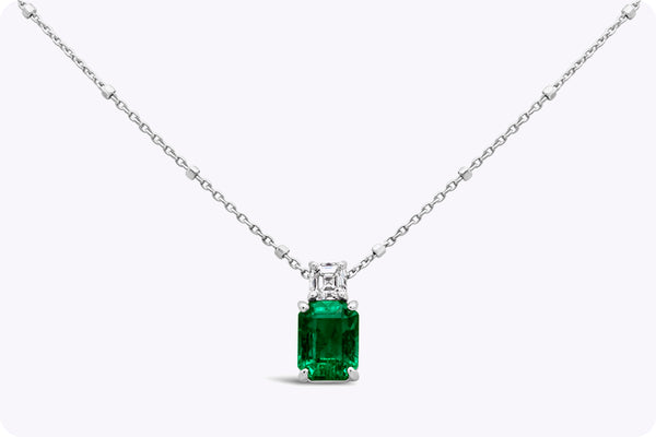 1.55 Carats Total Emerald Cut Emerald & Diamond Pendant Necklace in White Gold