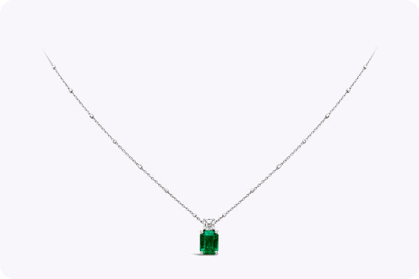 1.55 Carats Total Emerald Cut Emerald & Diamond Pendant Necklace in White Gold