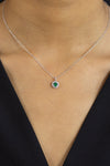Round Cut Emerald & Diamond Halo Pendant Necklace in White Gold