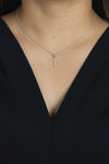 0.05 Carat Total Round Diamond Small Cross Pendant Necklace in White Gold