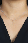 0.05 Carat Total Round Diamond Small Cross Pendant Necklace in White Gold