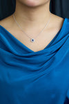 0.42 carat pear shape sapphire and diamond halo pendant necklace
