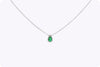 Beautiful 0.34 carat pear-shaped emerald pendant with diamond halo