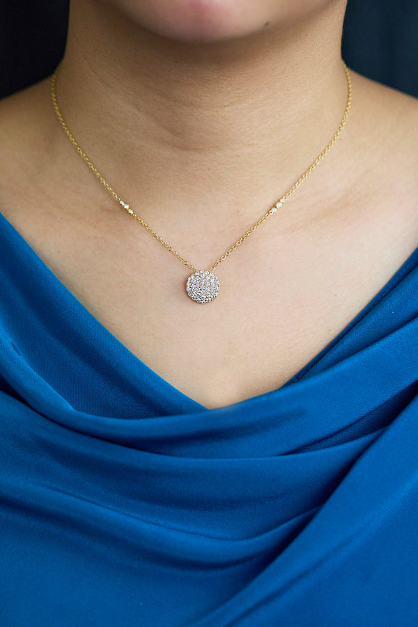 1.14 carat round-cut diamond disc pendant necklace in yellow gold