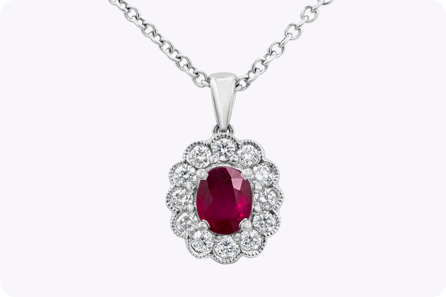 0.65 Carat Oval Cut Ruby & Diamond Halo Pendant Necklace in White Gold