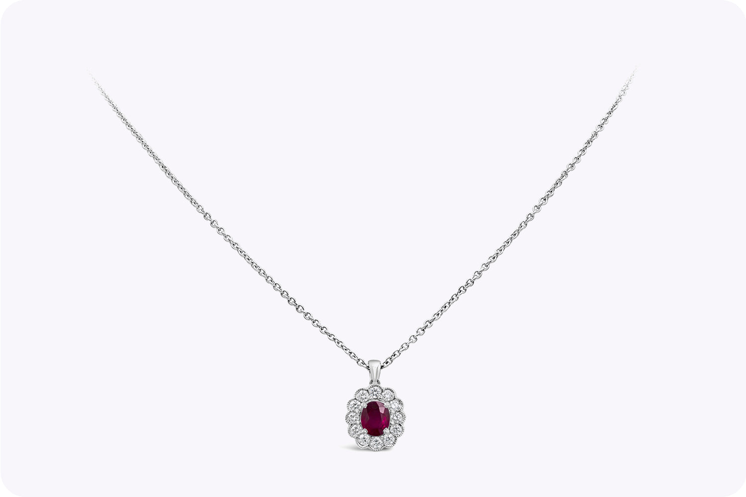 0.65 Carat Oval Cut Ruby & Diamond Halo Pendant Necklace in White Gold