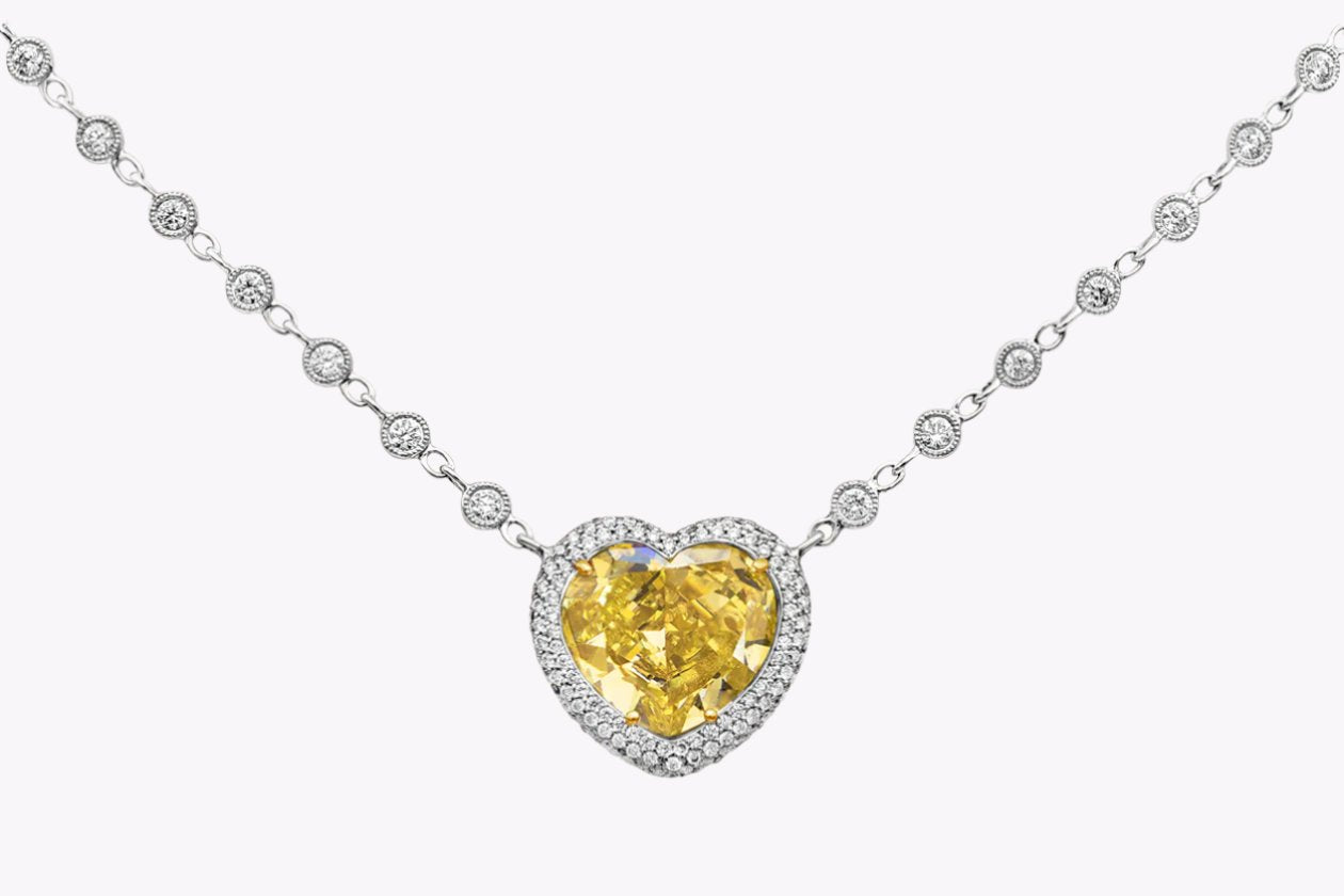 GIA Certified 7.77 Carats Heart Shape Yellow Diamond Pendant Necklace in Two-Tone Gold