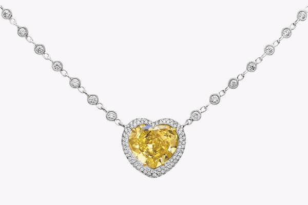 GIA Certified 7.77 Carats Heart Shape Yellow Diamond Pendant Necklace in Two-Tone Gold