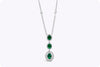 1.28 Carats Total Oval Cut Green Emerald and Diamond Halo Drop Pendant Necklace in White Gold