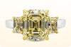 GIA Certified 5.17 Carats Emerald Cut Fancy Yellow Diamond Three-Stone Engagement Ring in Yellow Gold and Platinum