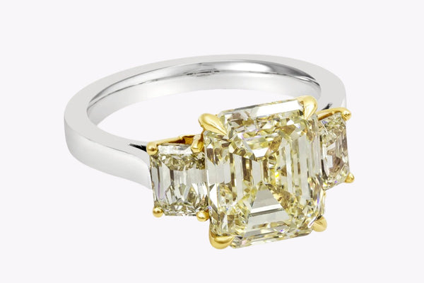 GIA Certified 5.17 Carats Emerald Cut Yellow Diamond Three-Stone Engagement Ring in Yellow Gold & Platinum