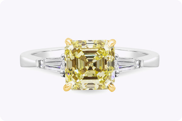 GIA Certified 2.13 Carats Asscher Cut Yellow Diamond Three-Stone Engagement Ring in Yellow Gold & Platinum