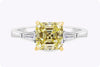 GIA Certified 2.13 Carats Asscher Cut Yellow Diamond Three-Stone Engagement Ring in Yellow Gold and Platinum