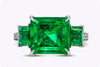 GIA Certified 4.82 Carats Emerald Cut Colombian Green Emerald with Diamond Three-Stone Engagement Ring in Platinum