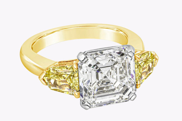 GIA Certified 5.05 Carats Asscher Cut Diamond Three-Stone Engagement Ring in Yellow Gold