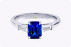 1.78 Carat Emerald Cut Blue Sapphire and Diamond Three Stone Engagement Ring in Platinum