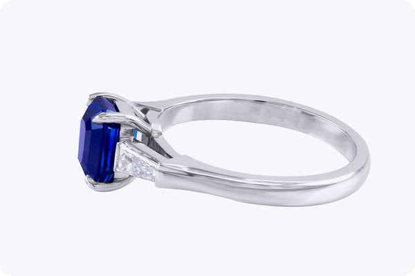 1.78 Carats Emerald Cut Blue Sapphire & Diamond Three-Stone Engagement Ring in Platinum