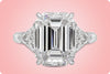 GIA Certified 5.46 Carat Emerald Cut Diamond Three-Stone Engagement Ring in Platinum