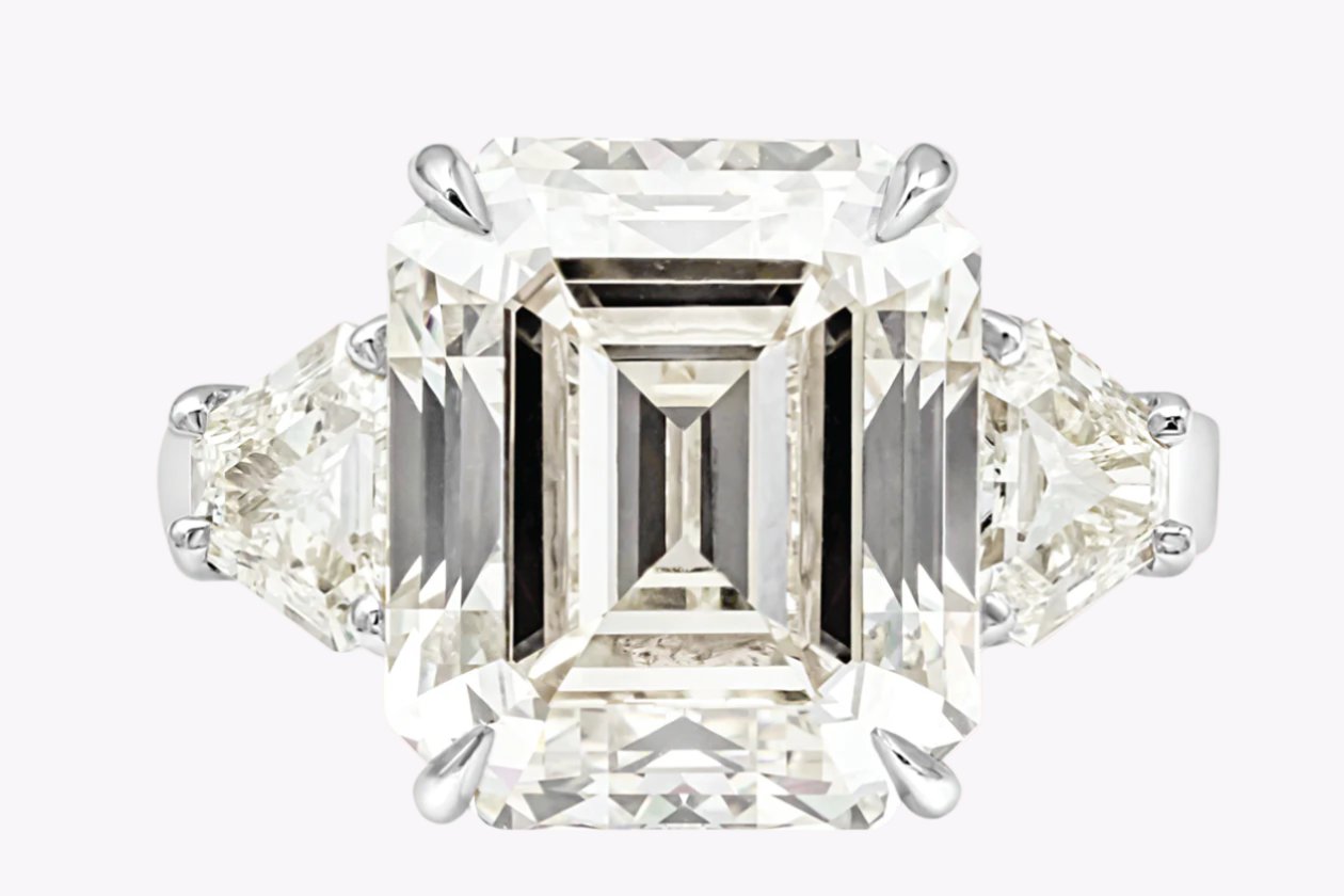 11.11 Carats Emerald Cut Diamond Three-Stone Engagement Ring in Platinum