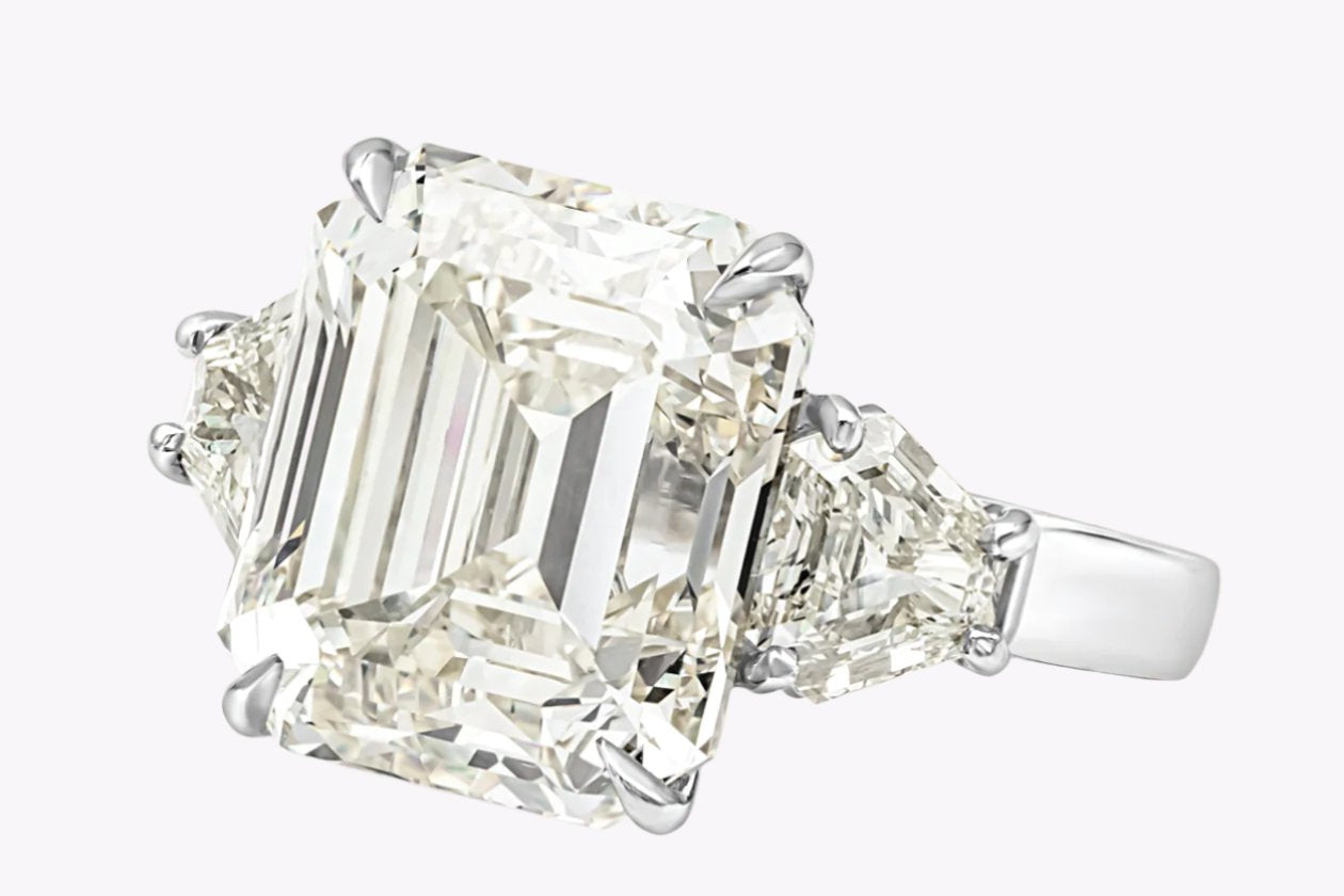 11.11 Carats Emerald Cut Diamond Three-Stone Engagement Ring in Platinum