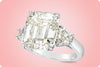 11.11 Carats Emerald Cut Diamond Three-Stone Engagement Ring in Platinum