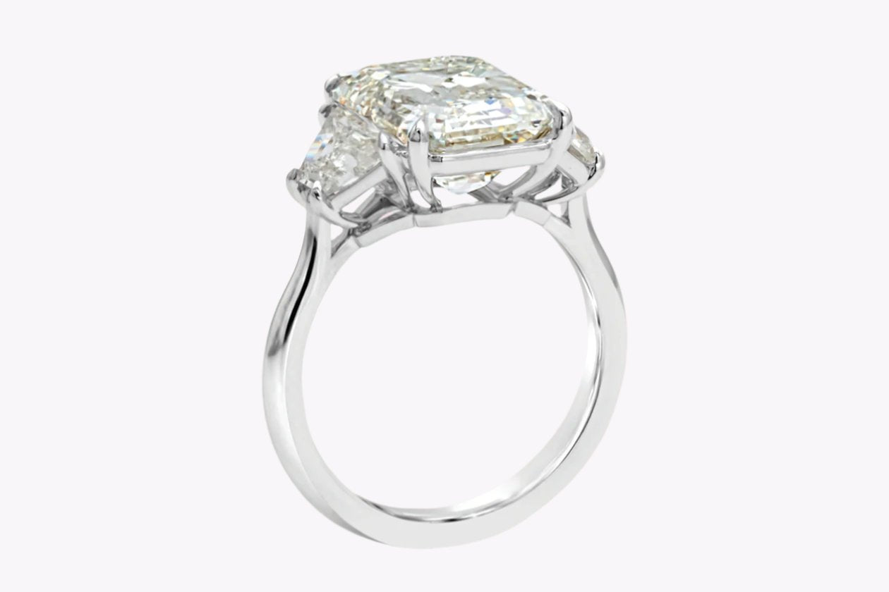 GIA Certified 5.81 Carats Emerald Cut Diamond Three-Stone Engagement Ring in Platinum