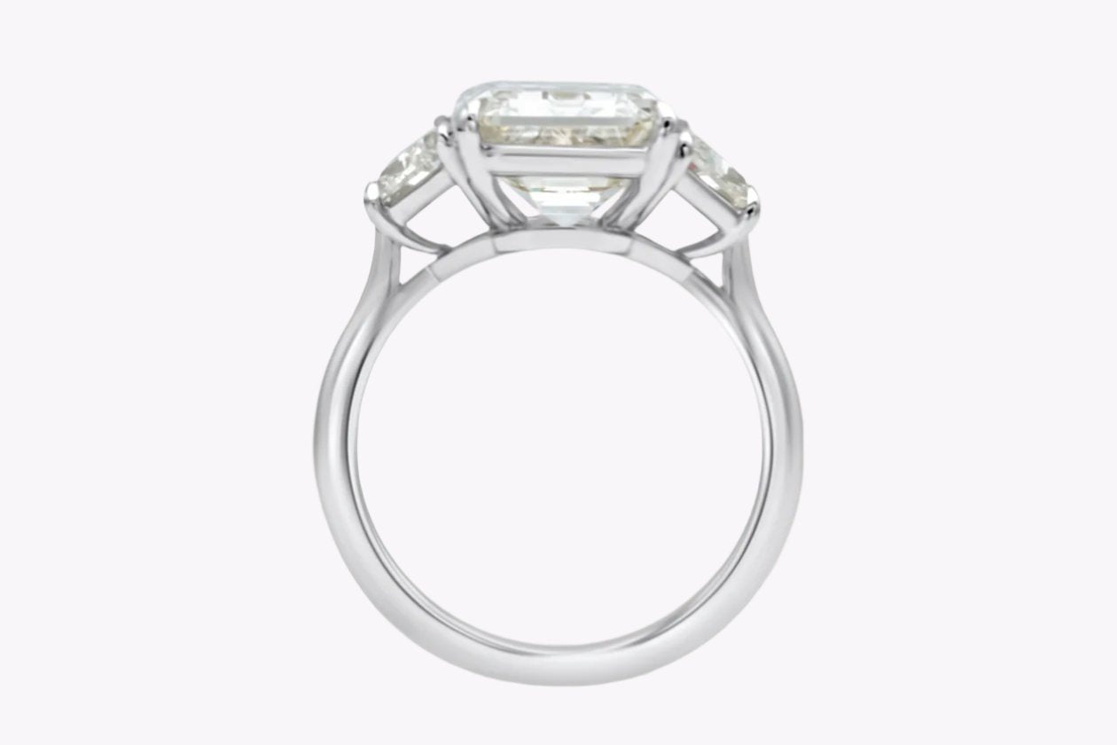 GIA Certified 5.81 Carats Emerald Cut Diamond Three-Stone Engagement Ring in Platinum