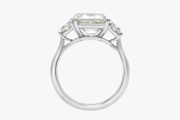 GIA Certified 5.81 Carats Emerald Cut Diamond Three-Stone Engagement Ring in Platinum