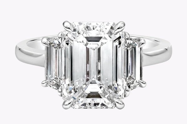 GIA Certified 4.07 Carats Emerald Cut Diamond Three-Stone Engagement Ring in Platinum