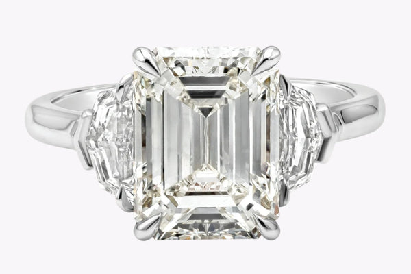 GIA Certified 4.20 Carats Emerald Cut Diamond Three-Stone Engagement Ring in Platinum