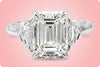 GIA Certified 4.20 Carat Emerald Cut Diamond Three Stone Engagement Ring in Platinum