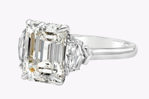 GIA Certified 4.20 Carats Emerald Cut Diamond Three-Stone Engagement Ring in Platinum