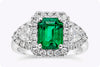 1.90 Carats Emerald Cut Green Emerald & Diamond Three Stone Halo Engagement Ring in White Gold