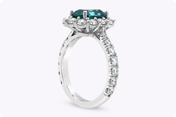 3.45 Carat Emerald Cut Blue Zirconia & Diamond Halo Engagement Ring in Platinum