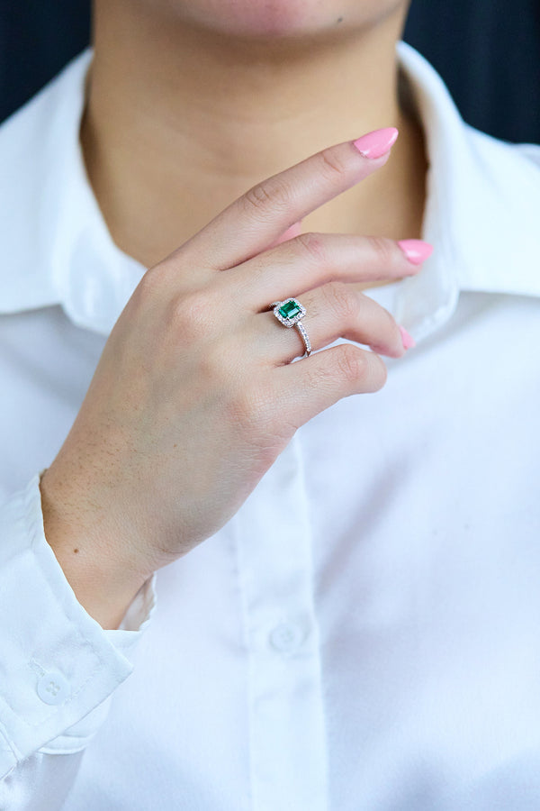 0.84 Carat Emerald Cut Emerald & Diamond Halo Engagement Ring in White Gold