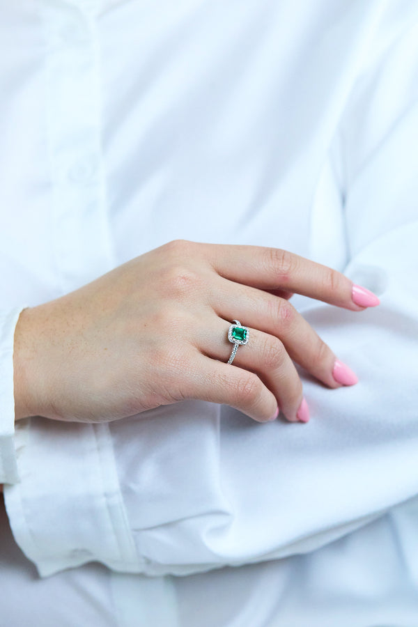 0.84 Carat Emerald Cut Emerald & Diamond Halo Engagement Ring in White Gold