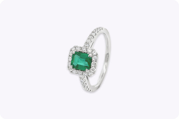 0.84 Carat Emerald Cut Emerald & Diamond Halo Engagement Ring in White Gold