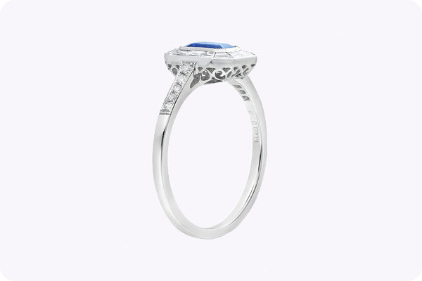 0.69 Carat Emerald Cut Sapphire & Baguette Halo Engagement Ring in Platinum