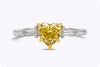 GIA Certified 1.01 Carats Heart Shape Fancy Vivid Yellow Diamond Three Stone Engagement Ring in Platinum