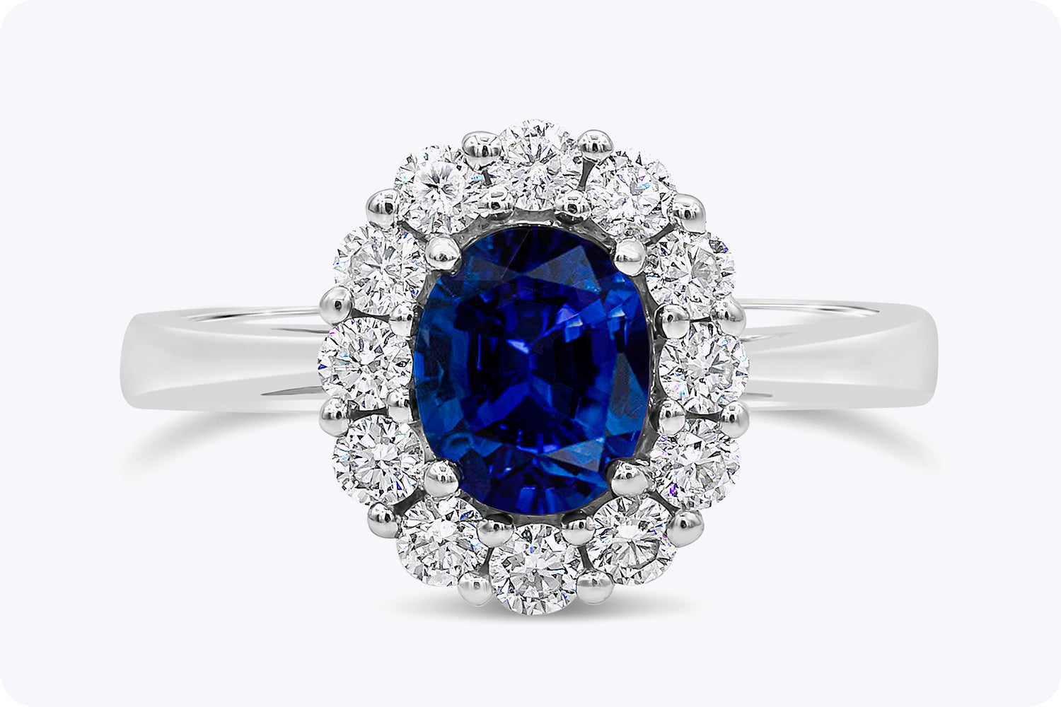 1.60 Carats Oval Cut Blue Sapphire & Diamond Halo Engagement Ring in White Gold