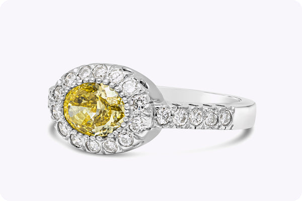 GIA Certified 1.03 Carats Oval Cut Yellow Diamond Halo Engagement Ring in Platinum