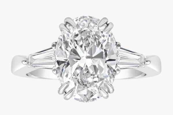 GIA Certified 4.01 Carats Oval Cut Diamond Three-Stone Engagement Ring in Platinum