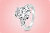 GIA Certified 4.01 Carat Oval Cut Diamond Three Stone Engagement Ring in Platinum