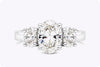 GIA Certified 2.21 Carat Oval Cut Diamond Three-Stone Engagement Ring in Platinum