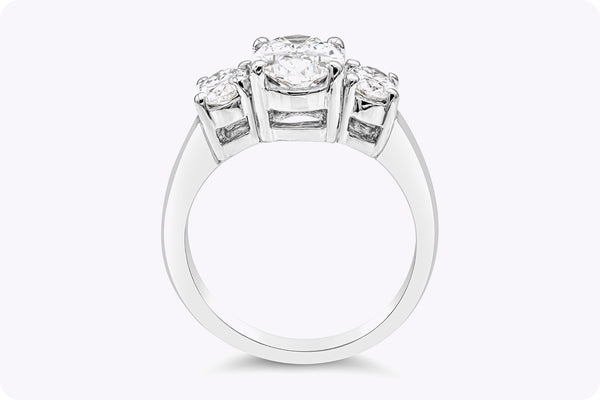 GIA Certified 2.21 Carat Oval Cut Diamond Three-Stone Engagement Ring in Platinum